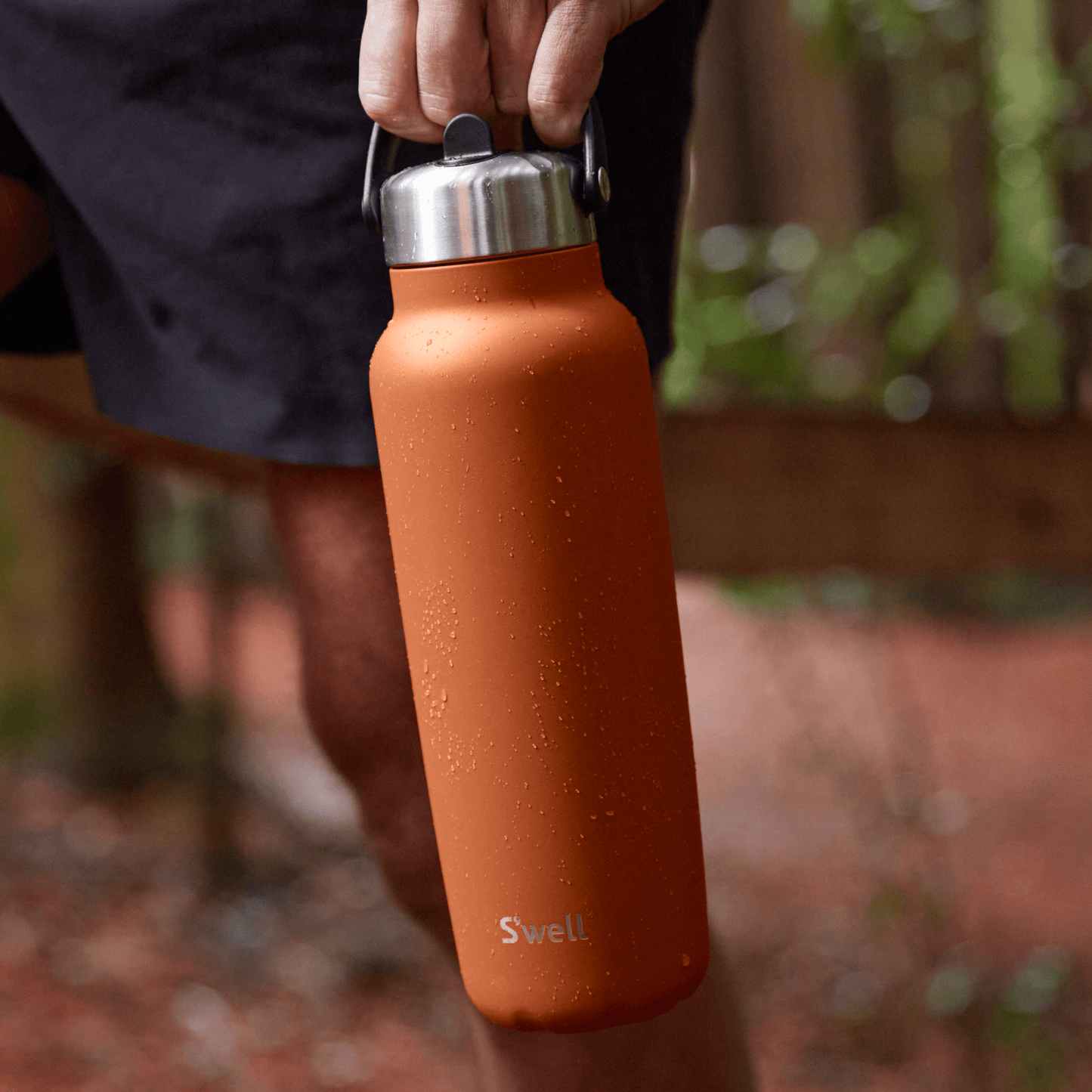explorer-with-flip-straw-lid-40oz-e1 Swell-Explorer-Water-Bottle-40oz-Orange-Carnelian-LifeStyle.png